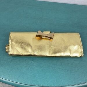 Tarte gold brush holder bag